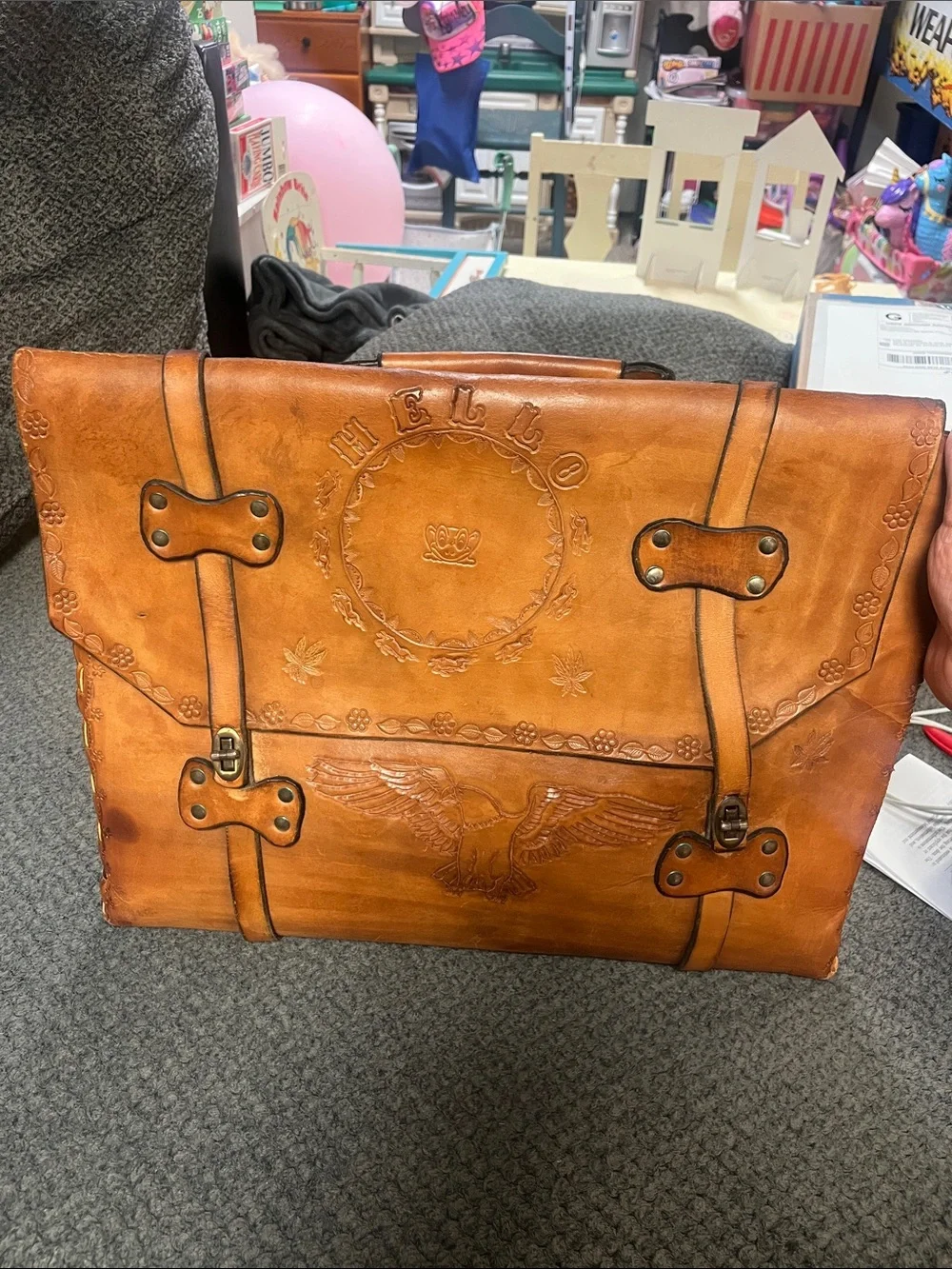 Hand-Tooled Tan Leather Briefcase with Embossed Motifs